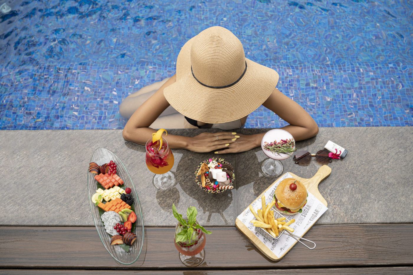 Relaxing poolside experience at Conrad Pune Luxury by Hilton