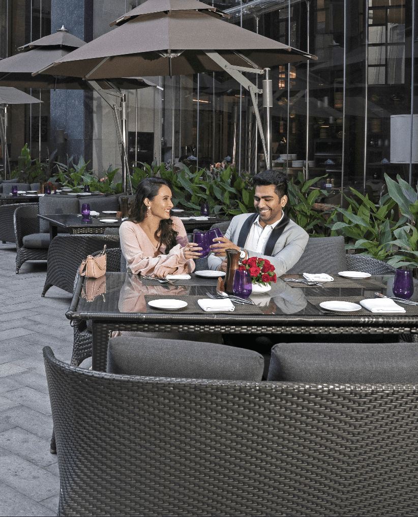 Romantic dinner at Conrad Pune Luxury by Hilton rooftop dining